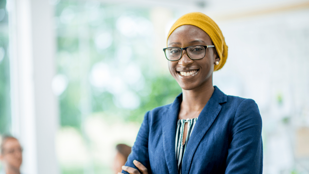 A professional-looking woman smiling confidently