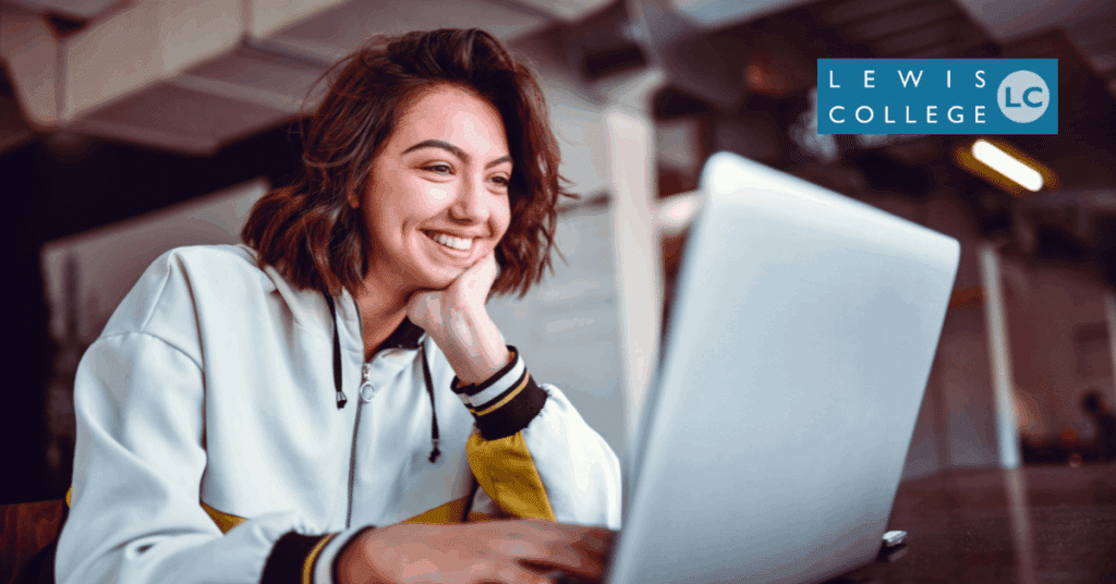 Changing your career following redundancy, studying online with Lewis College on laptop.