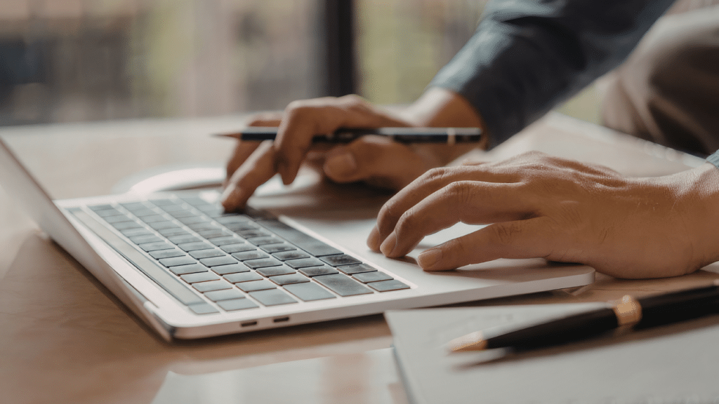 Personal assistant working in UK office environment managing tasks.